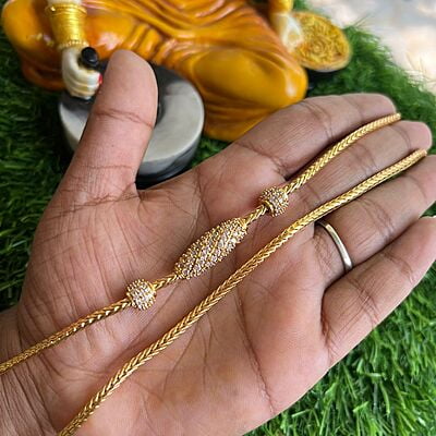 Gold mugappu chain designs on sale
